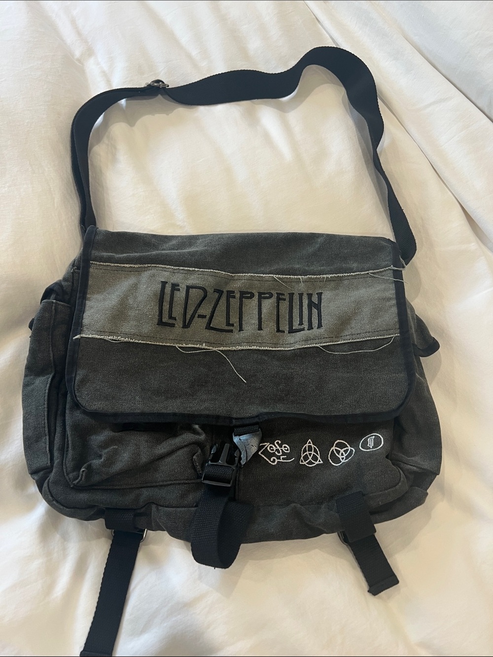 Black Canvas Messenger Bag with Band Logo